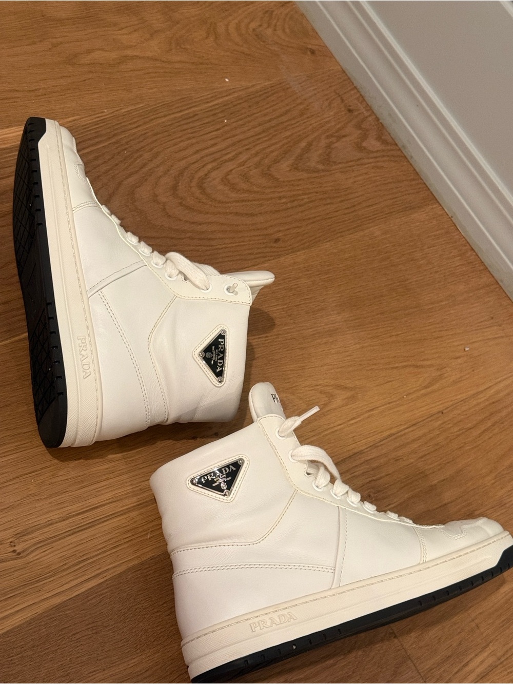 Prada Women White High-Top Leather Sneakers with Black Sole